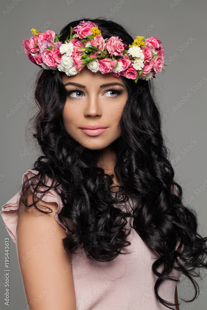 Beautiful Brunette Woman with Summer Flowers on her Head