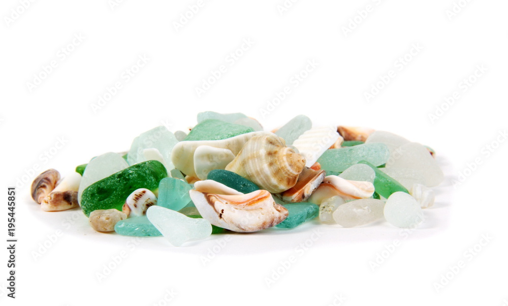 Sea finds. Sea glass and shells on white Sea finds. Sea glass and shells on white