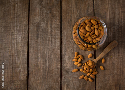 almonds on wooden surface