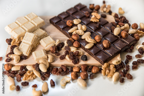 chocolate, milk chocolate with nuts, on a white background