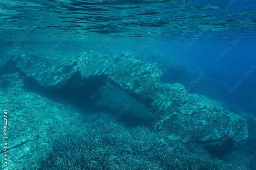 Natural rock formation below water surface in the Mediterranean sea, Catalonia, Cap de Creus, Costa Brava, Spain