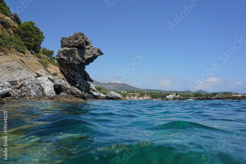 Spain Costa Brava natural rock formation on the seashore near Cadaques  seen from water surface  Cap de Creus  Mediterranean sea  Alt Emporda  Catalonia