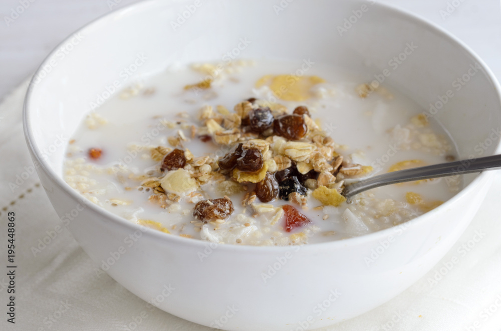 Muesli bowl with mix of unprocessed whole grains, nuts, seeds, fruit and vegan milk. Delicious breakfast meal for energize your day. Heathy food lifestyle. Muesli bowl with mix of unprocessed whole grains, nuts, seeds, fruit and vegan milk. Delicious breakfast meal for energize your day. Heathy food lifestyle.