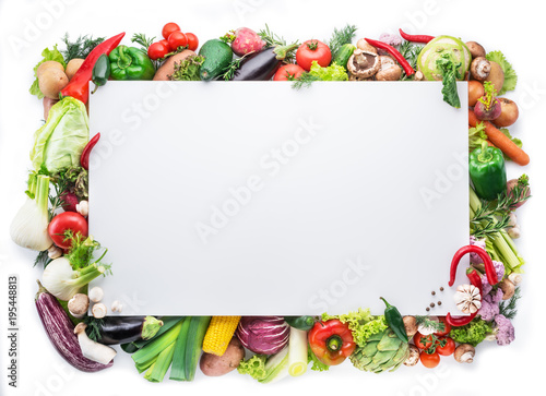 Fototapeta Naklejka Na Ścianę i Meble -  Different colorful vegetables arranged as a frame on white background.