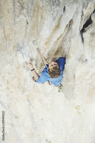 Rock-climbing in Turkey. The climber climbs on the route. Photo from the top. © vetal1983
