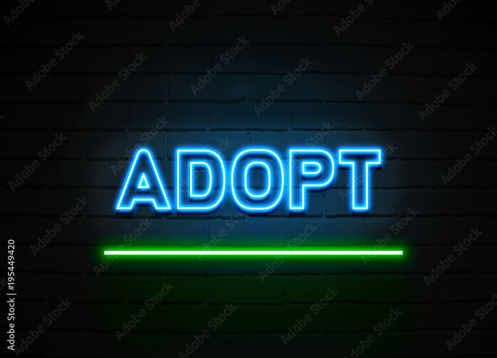 Adopt neon sign mounted on brick wall. Adopt neon sign mounted on brick wall.