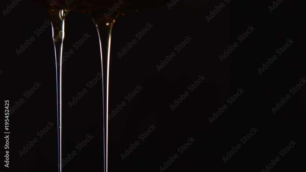 Three Strands of Honey Drip from Spoon Three Strands of Honey Drip from Spoon
