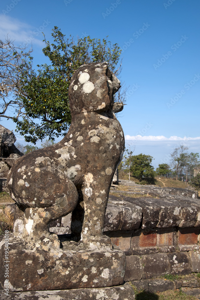 Dangrek Mountains Cambodia, Guardian lion looking over the Naga Balustrade at the 11th century Preah Vihear Temple complex