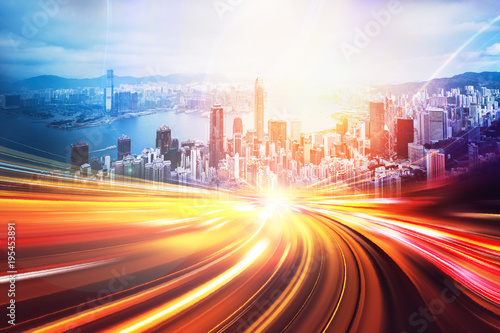 Photography Motion speed light effect with Hong Kong cityscape on background