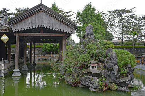 The Truong du Pavilion and lake within the Dien Tho Residence in the Imperial City, Hue, Vietnam photo