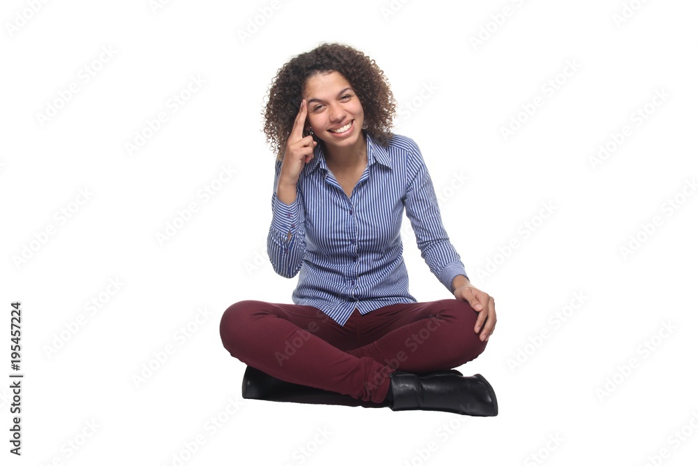 Afro woman sitting on the floor Afro woman sitting on the floor