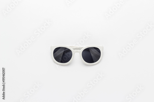 studio shot of white sunglasses not isolated