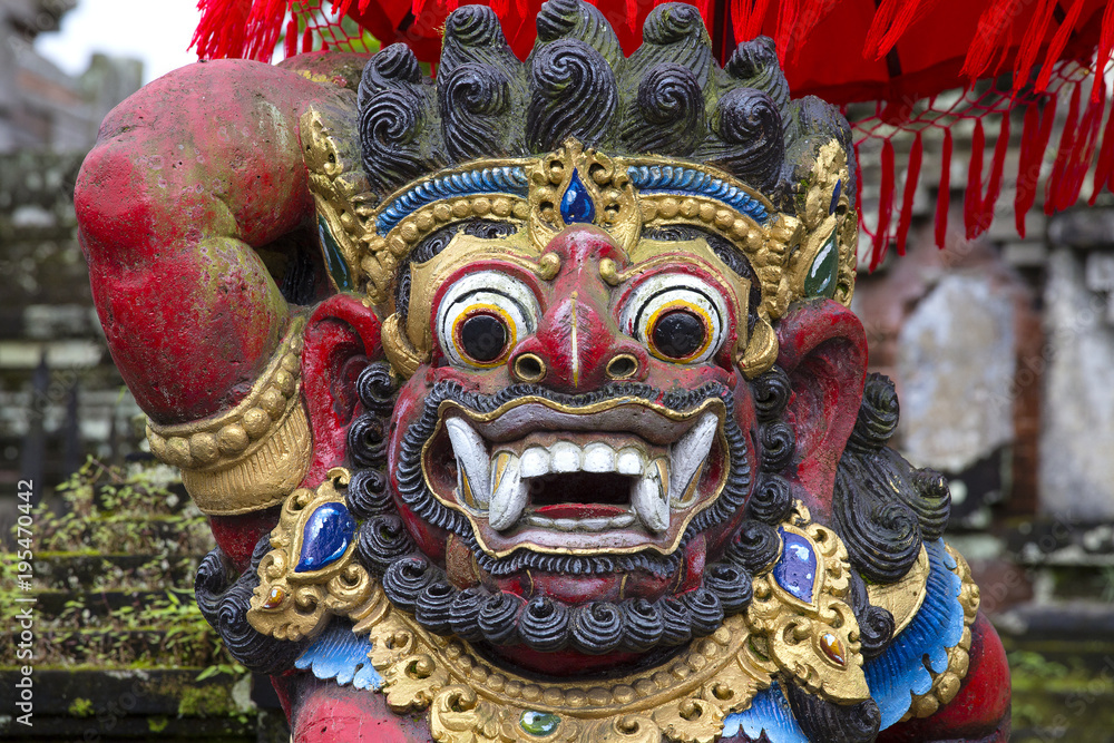 Traditional Balinese statue of Barong on a street temple in Bali, Indonesia Traditional Balinese statue of Barong on a street temple in Bali, Indonesia