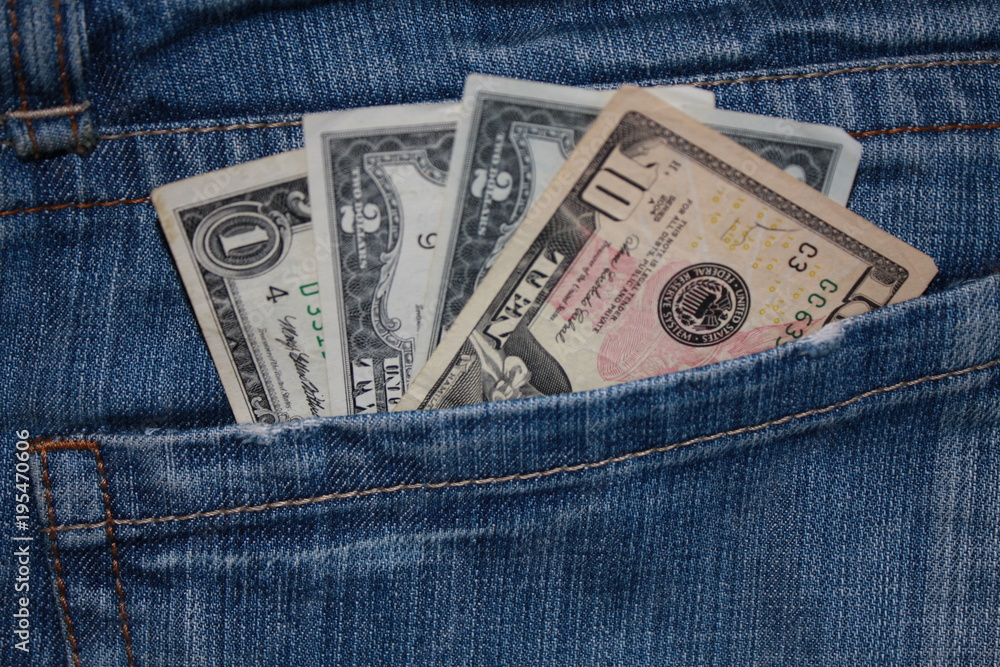 Several U.S. dollars in jeans pocket Several U.S. dollars in jeans pocket