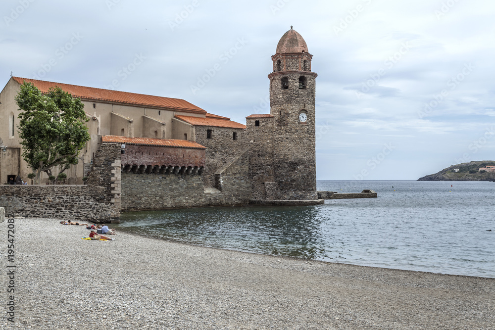 View of village Collioure in Cote Vermeille coast. Tower and church.France.