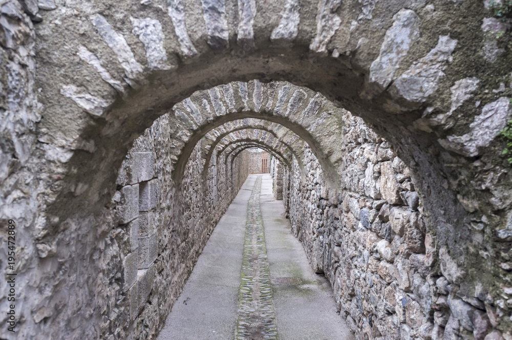 Ancient street of medieval village of Villefranche-de-Conflent, France.