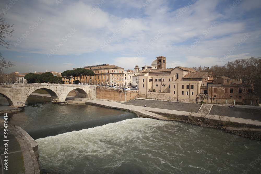 Tiberina and bridge Ponte Cestio, Tiber river.Roma. Tiberina and bridge Ponte Cestio, Tiber river.Roma.