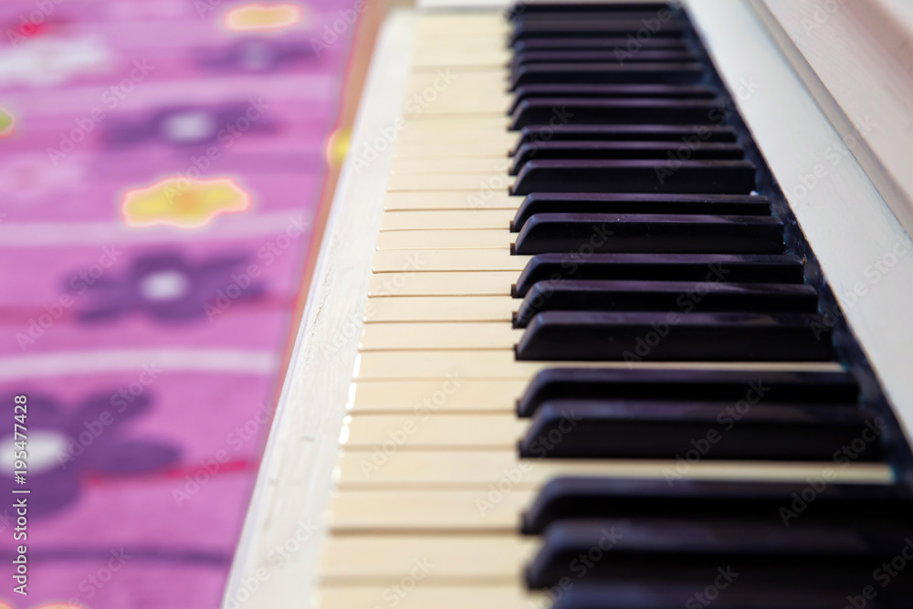 Piano keyboard background with close up shot.Fair in blurred and de-focus, Soft focus,Select focus Piano keyboard background with close up shot.Fair in blurred and de-focus, Soft focus,Select focus