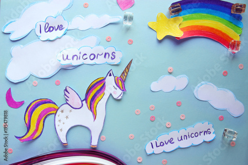 paper application with a picture of a unicorn and a rainbow.I love unicorns