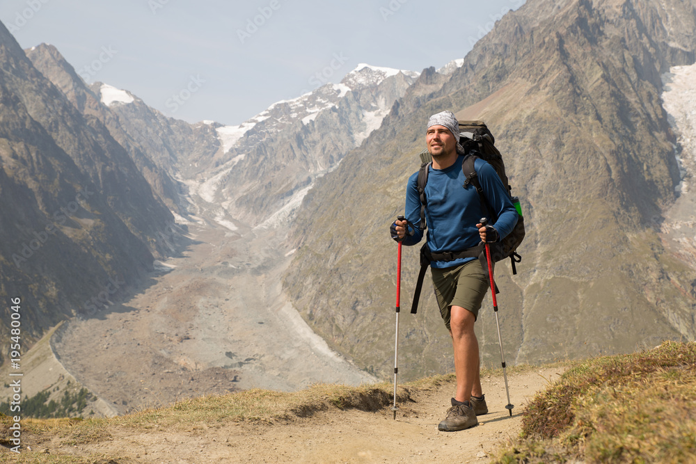 Fototapeta premium campaign to mountains with a tent 