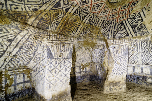 Tierradentro - burial caves painted with red, black and whte geometric patterns in Colombia photo