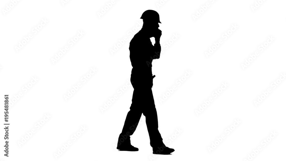 Builder speaks on the phone and screams at his subordinates. White background. Silhouette. Side view Builder speaks on the phone and screams at his subordinates. White background. Silhouette. Side view