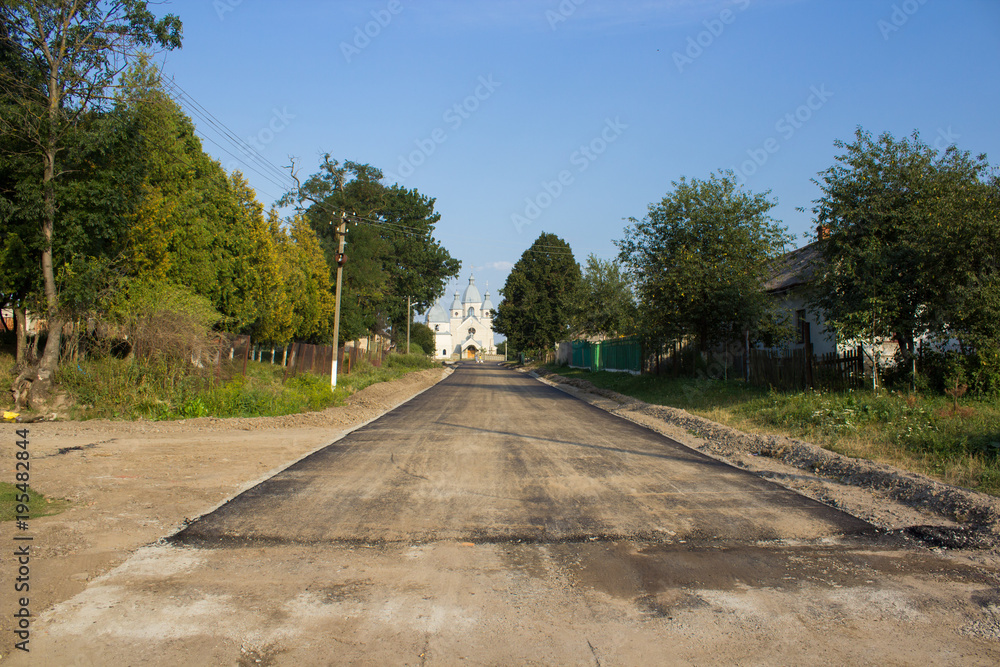 beginning of an asphalted road