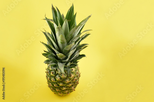 Ripe pineapple stock images. Pineapple on a yellow background