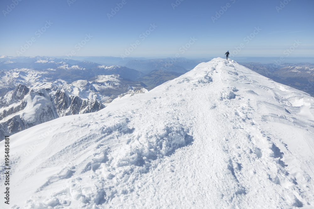 Mountaineering ascending to the top of mount Mont Blanc in French Alps. Chamonix, France