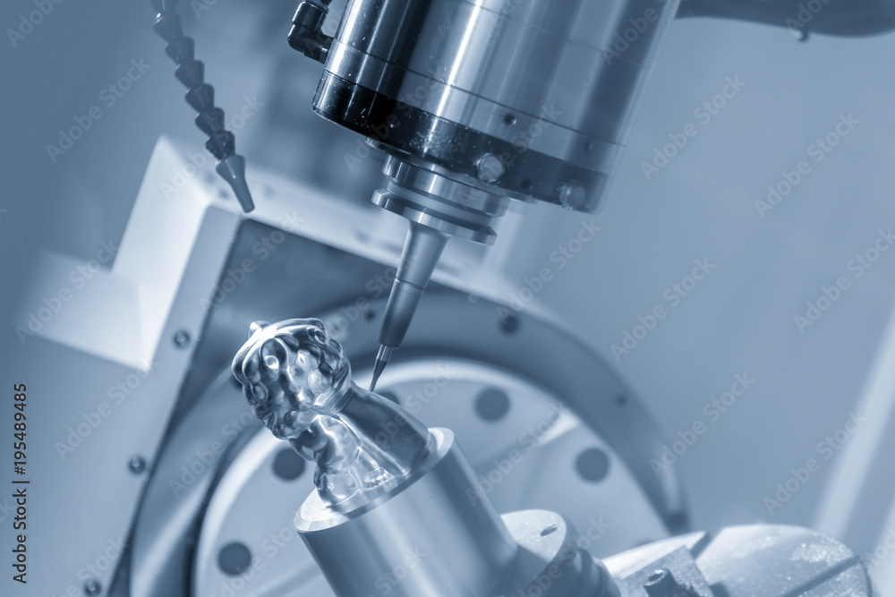 The 5 axis CNC machine cutting the sample part with the solid ball end mill. The 5 axis CNC machine cutting the sample part with the solid ball end mill.