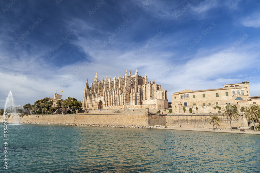 City view, iconic monuments, pond and cathedral or La Seu, Palma, Balearic Islands.