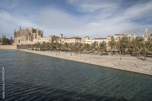 City view, iconic monuments, pond and cathedral or La Seu, Palma, Balearic Islands.