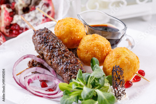 The original national dish is lulia kebab and potato balls. photo