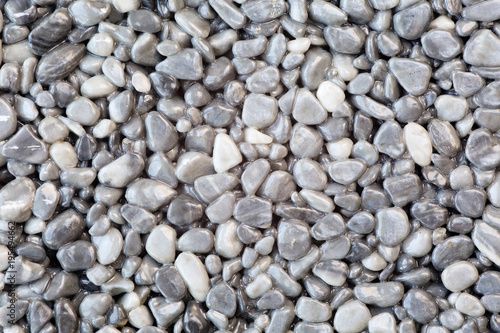 Close up of a natural stone carpet. Decorative stone coating. Slip resistant floor finish containing natural stone particles