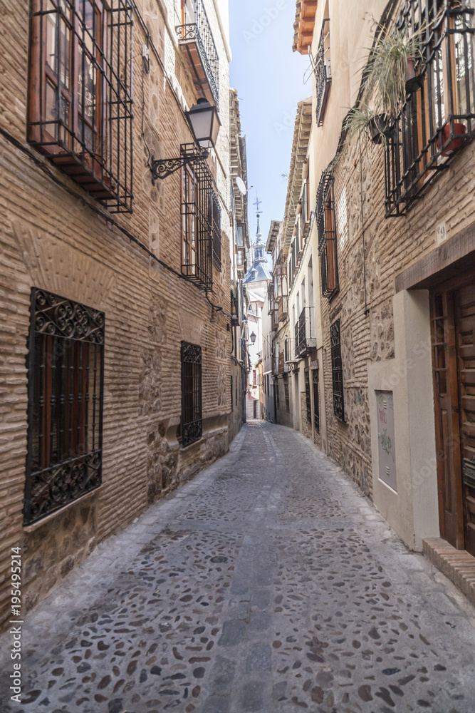 Narrow street in historic center of Toledo. Spain.