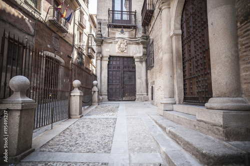 Old street and buildings in historical center of Toledo, Castilla- La Mancha, Spain.