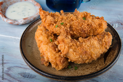 Crispy chicken tenderloid deep fried.