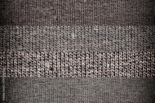 Dark background from a textile material with wicker, close-up fabric texture