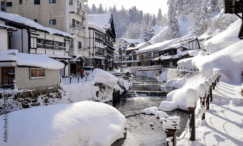 romantic winter snow in Obanazawa Ginzan Onsen, Japan hot springs town.