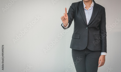 happy young businesswoman with hands up.