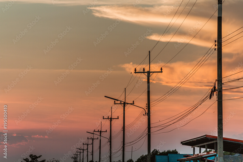 silhouette electric pole and sunset time