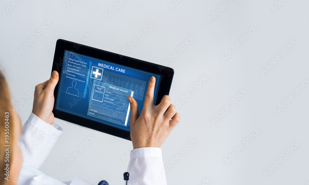Close of female doctor hands working with tablet pc computer Close of female doctor hands working with tablet pc computer