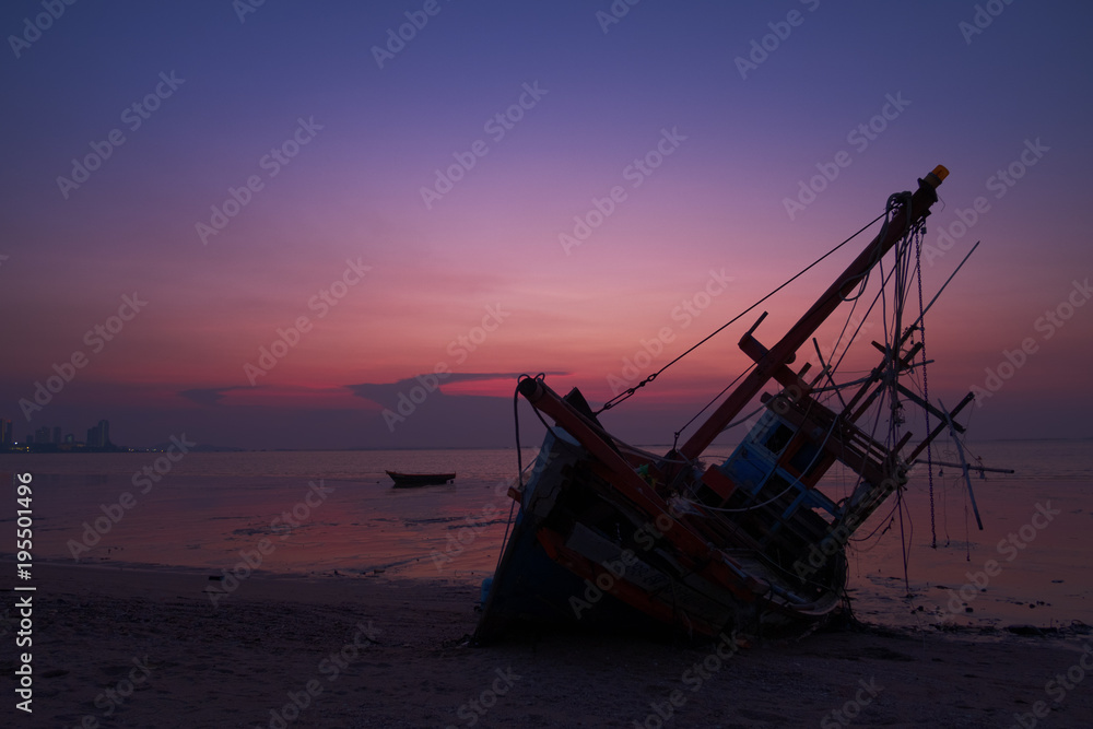 The Wreck was left on the beach with the beautiful twilight sky.