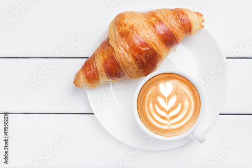 Fotografiet coffee croissant view from above wooden background white