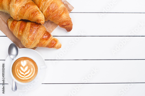 coffee croissant view from above wooden background white