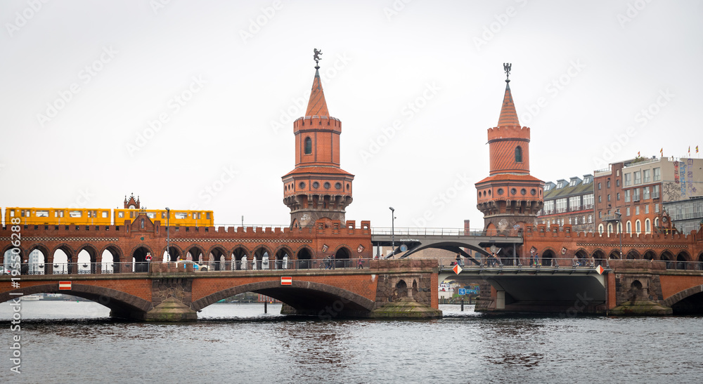 U-Bahn train passing over Oberbaum Bridge in Berlin, Germany U-Bahn train passing over Oberbaum Bridge in Berlin, Germany