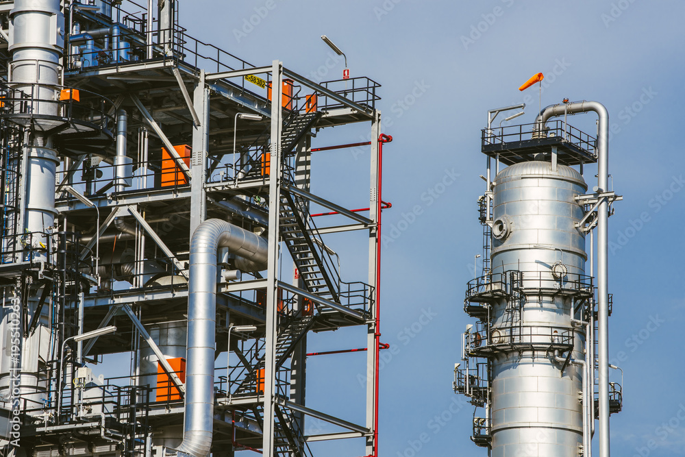 Industrial zone,The equipment of oil refining,Close-up of industrial pipelines of an oil-refinery plant,Detail of oil pipeline with valves in large oil refinery. Industrial zone,The equipment of oil refining,Close-up of industrial pipelines of an oil-refinery plant,Detail of oil pipeline with valves in large oil refinery.