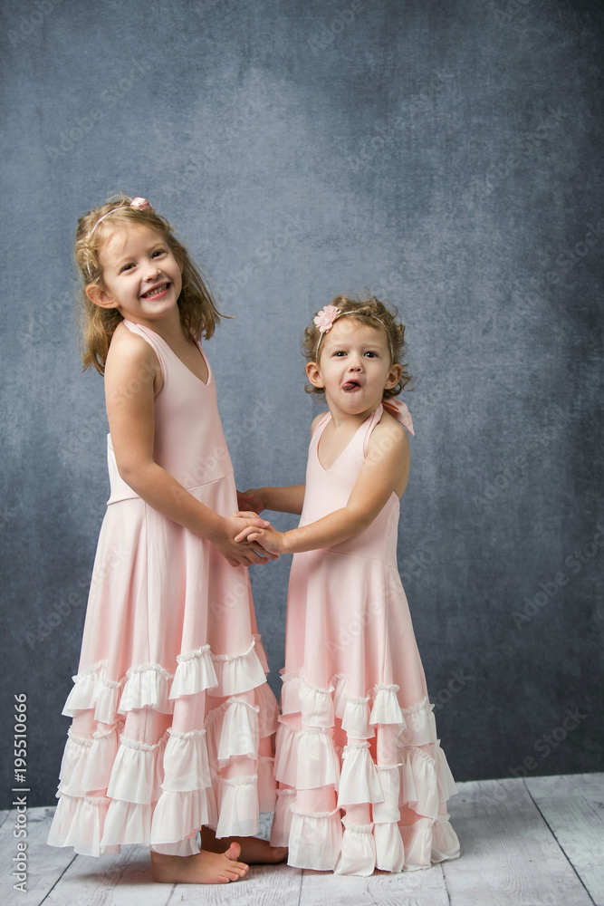 Silly Sisters Siblings in Pink Dresses Silly Sisters Siblings in Pink Dresses