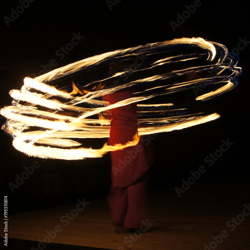 Girls fireshow in the night photo