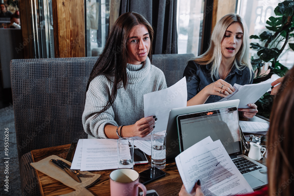 Two businesswoman working together about documents, partner discuss plan or idea and opinion meeting Two businesswoman working together about documents, partner discuss plan or idea and opinion meeting